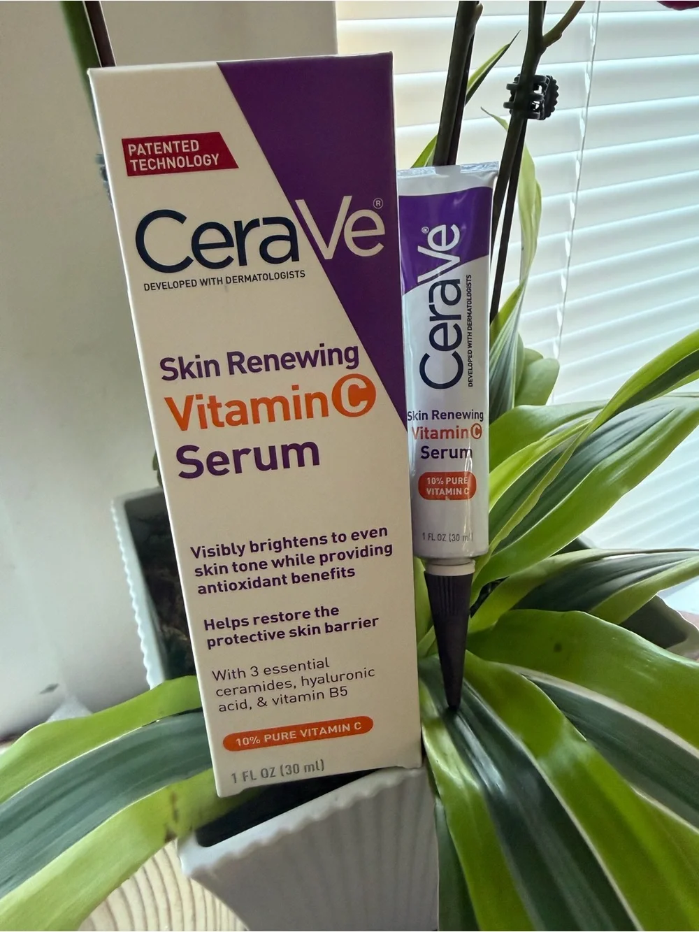 rave Vitamin C Serum Tube and Box in White and Purple